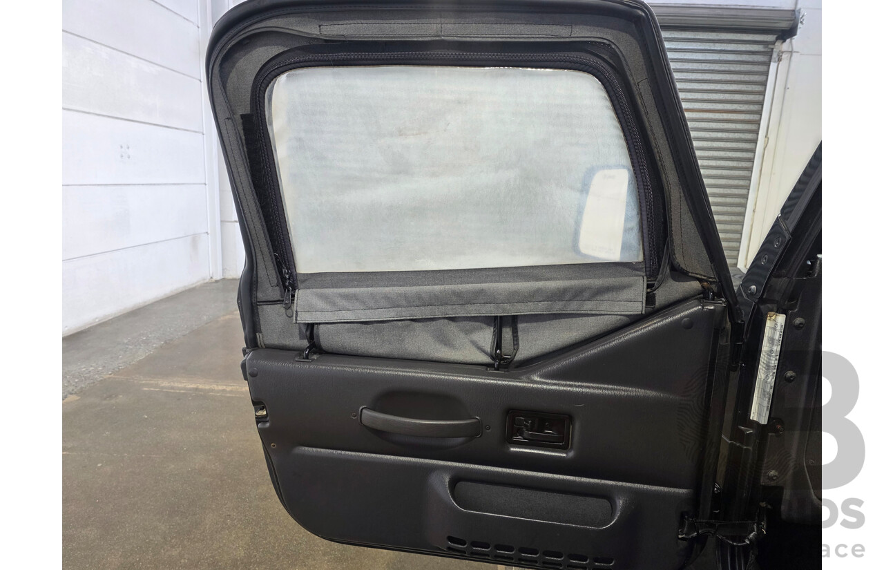 10/2002 Jeep Wrangler Sport (4x4) TJ 2d Softtop Black V6 4.0L