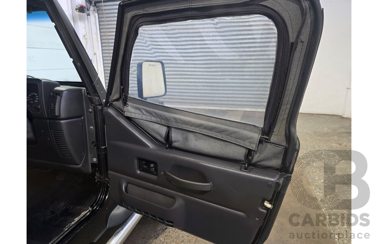10/2002 Jeep Wrangler Sport (4x4) TJ 2d Softtop Black V6 4.0L
