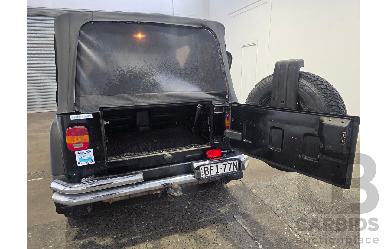 10/2002 Jeep Wrangler Sport (4x4) TJ 2d Softtop Black V6 4.0L