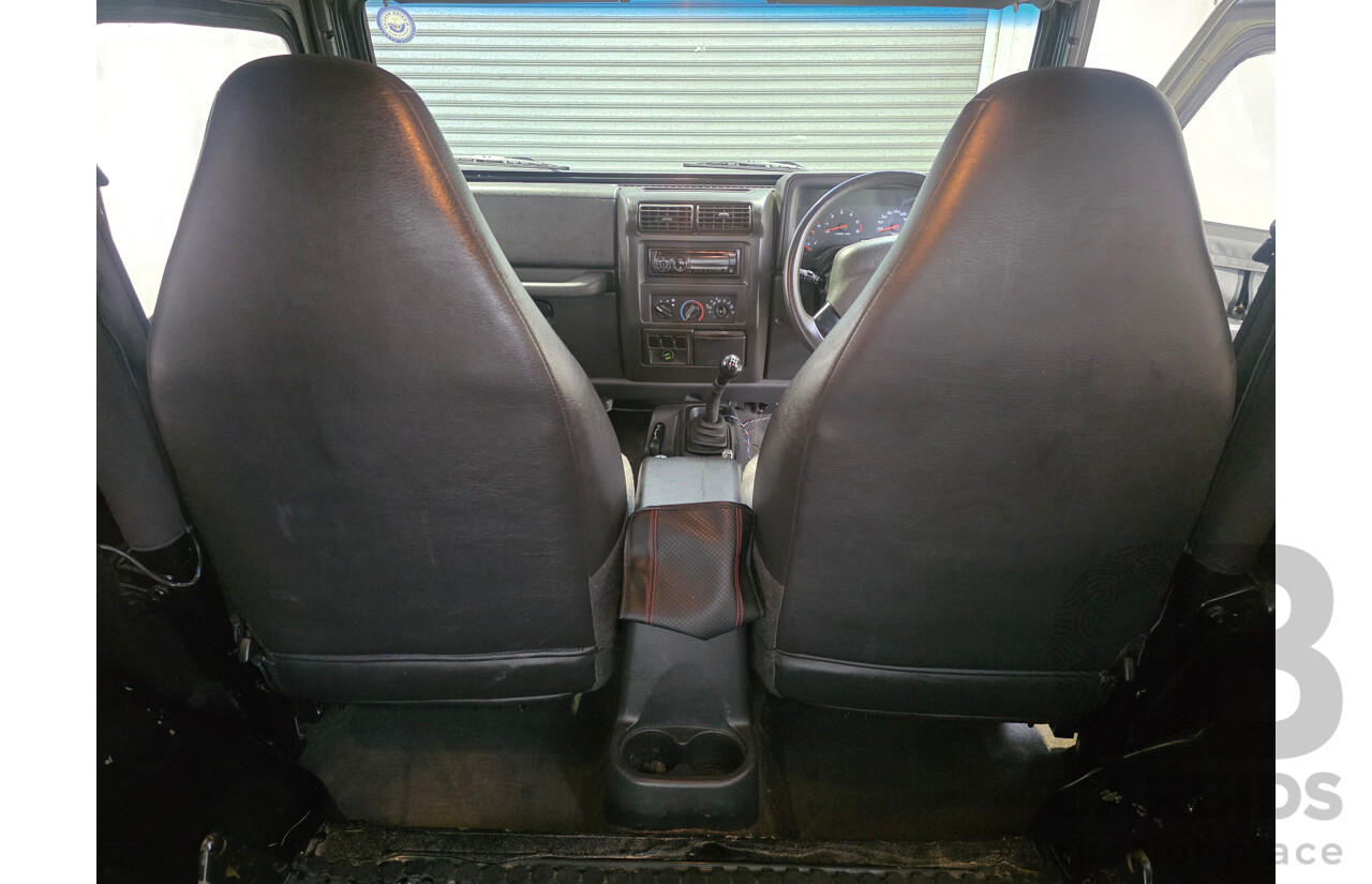 10/2002 Jeep Wrangler Sport (4x4) TJ 2d Softtop Black V6 4.0L