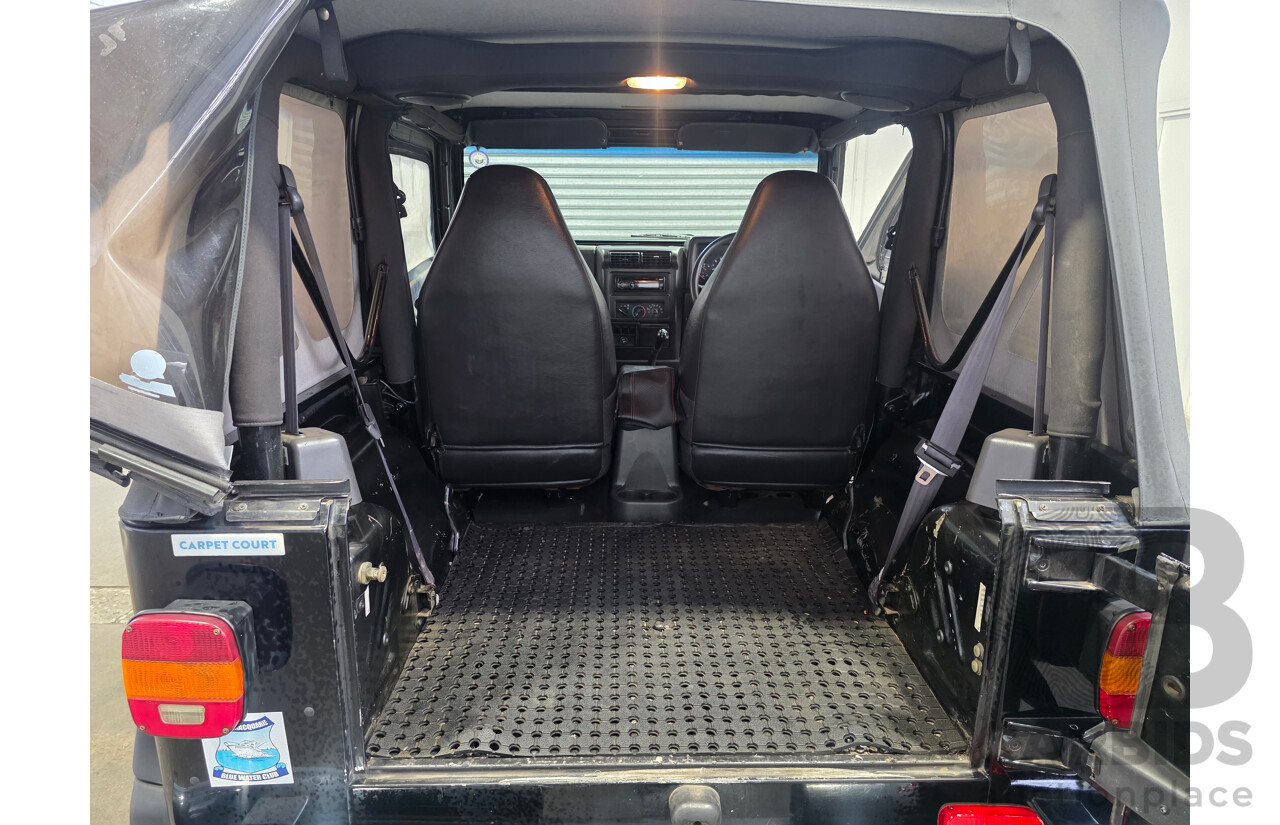 10/2002 Jeep Wrangler Sport (4x4) TJ 2d Softtop Black V6 4.0L