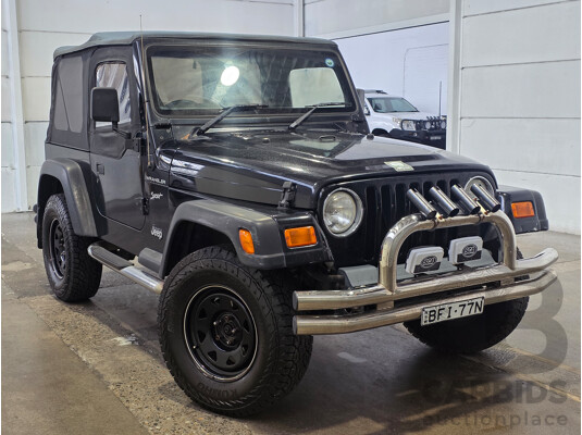 10/2002 Jeep Wrangler Sport (4x4) TJ 2d Softtop Black V6 4.0L