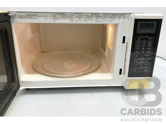 1662563 · Sharp Carousel Sensor 1100 Watt Microwave Oven