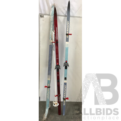 Assorted Jarvinen Skis and Dinsport XL Eskimo Ski Boots