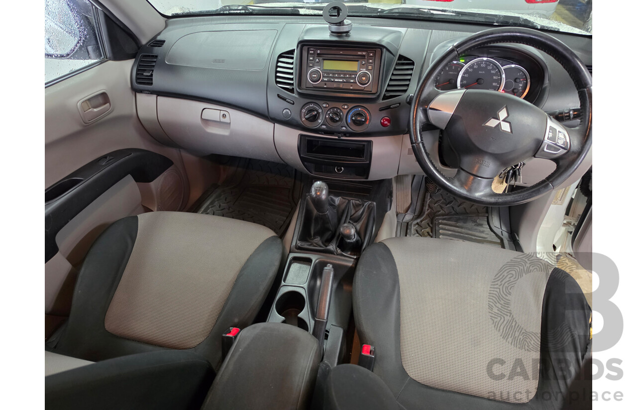 06/2013 Mitsubishi Triton GLX (4x4) MN MY13 Double Cab Utility White Turbo Diesel 2.5L