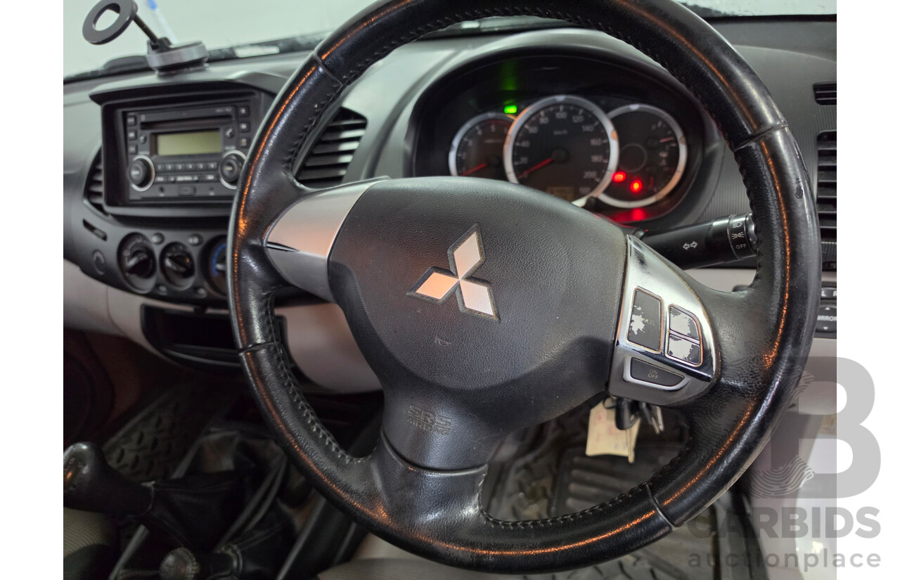 06/2013 Mitsubishi Triton GLX (4x4) MN MY13 Double Cab Utility White Turbo Diesel 2.5L