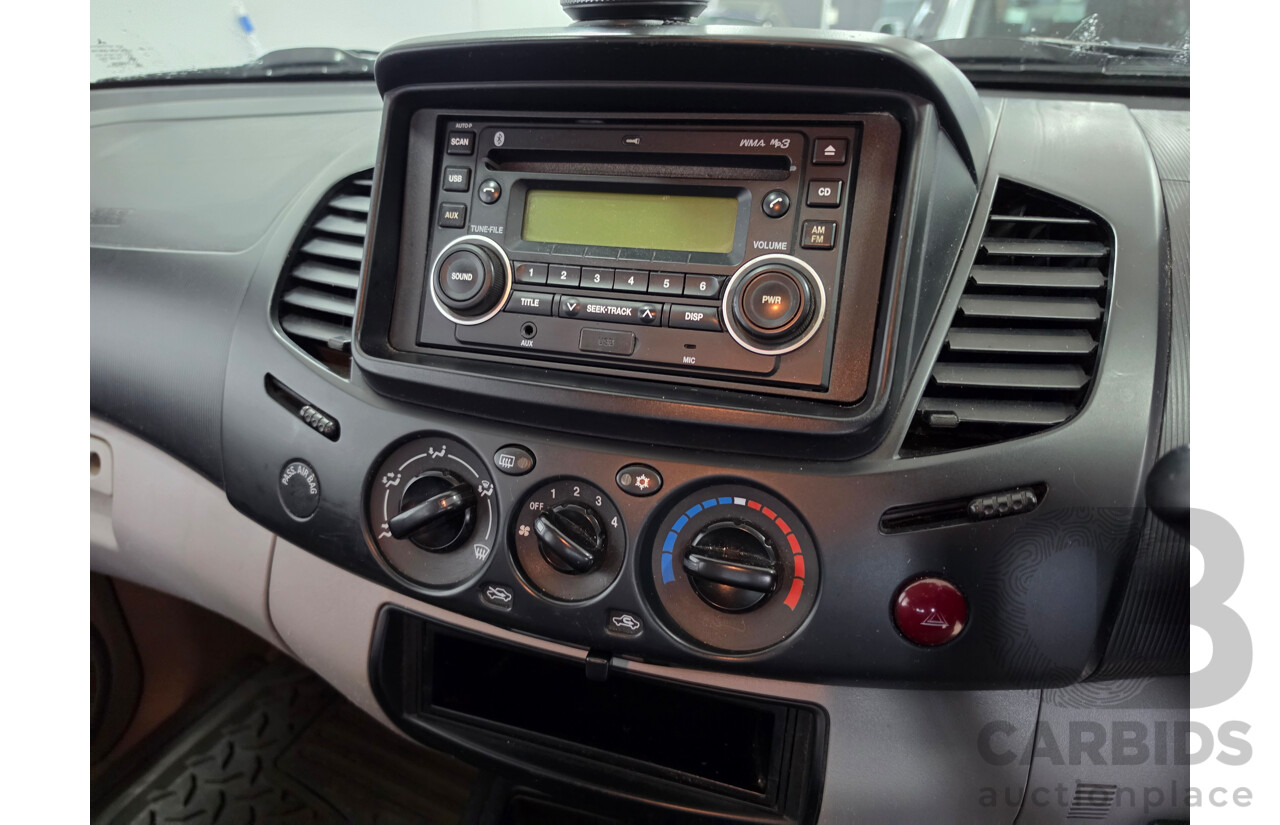 06/2013 Mitsubishi Triton GLX (4x4) MN MY13 Double Cab Utility White Turbo Diesel 2.5L
