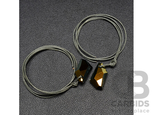 1660558 · Golden Shadow Crystal Pendants by Swarovski - Lot of 2