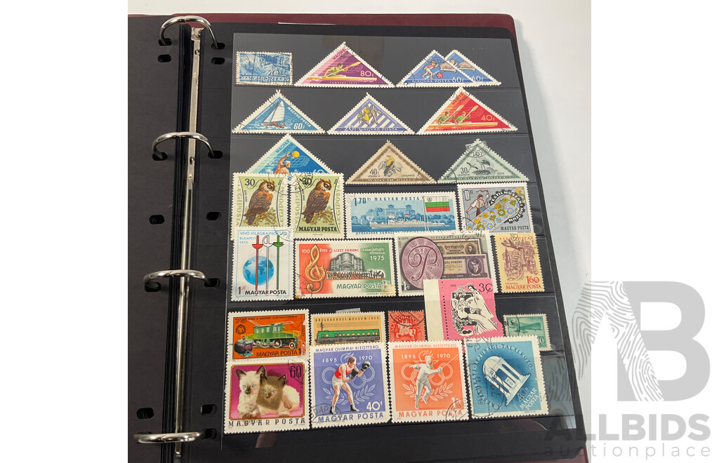 Album of Vintage and Antique International Stamps Including Hungary, Malta, Ireland, Maldives, Luxembourg, Liberia, Indonesia, Netherlands, Kenya, Jordan, Libam, Latvia, Iran