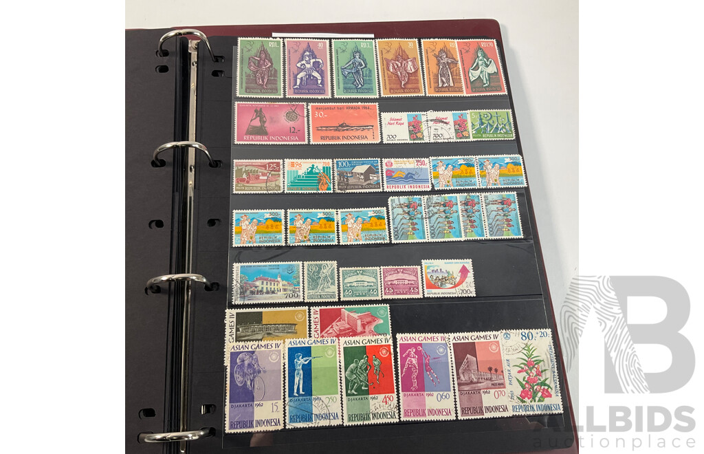 Album of Vintage and Antique International Stamps Including Hungary, Malta, Ireland, Maldives, Luxembourg, Liberia, Indonesia, Netherlands, Kenya, Jordan, Libam, Latvia, Iran