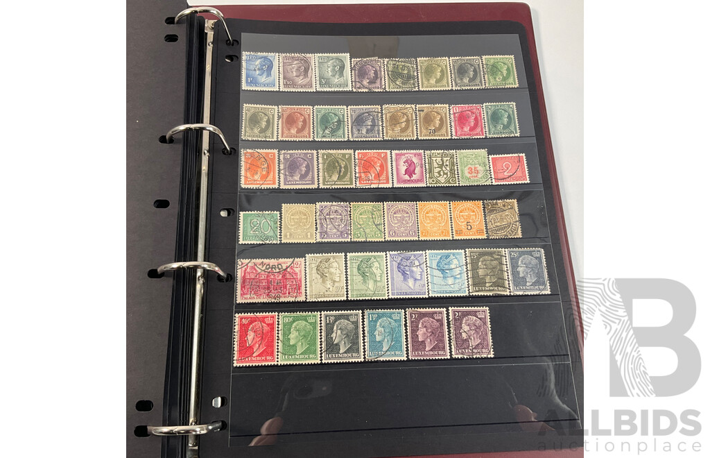 Album of Vintage and Antique International Stamps Including Hungary, Malta, Ireland, Maldives, Luxembourg, Liberia, Indonesia, Netherlands, Kenya, Jordan, Libam, Latvia, Iran