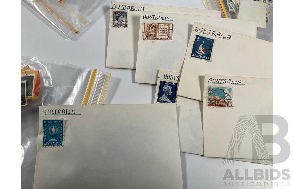 Collection of Vintage Australian Stamps and Packs Including 1983 Annual Album, Two War and Peace Packs, Customs Duty, Woolworths Cash Saver Stamps, Waltons Credit Certificate, Bagged Stamps on Paper