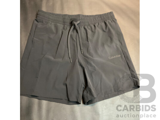 1661871 · Lacoste T-shirt & Calvin Klein Shorts Size XL - Lot of 3