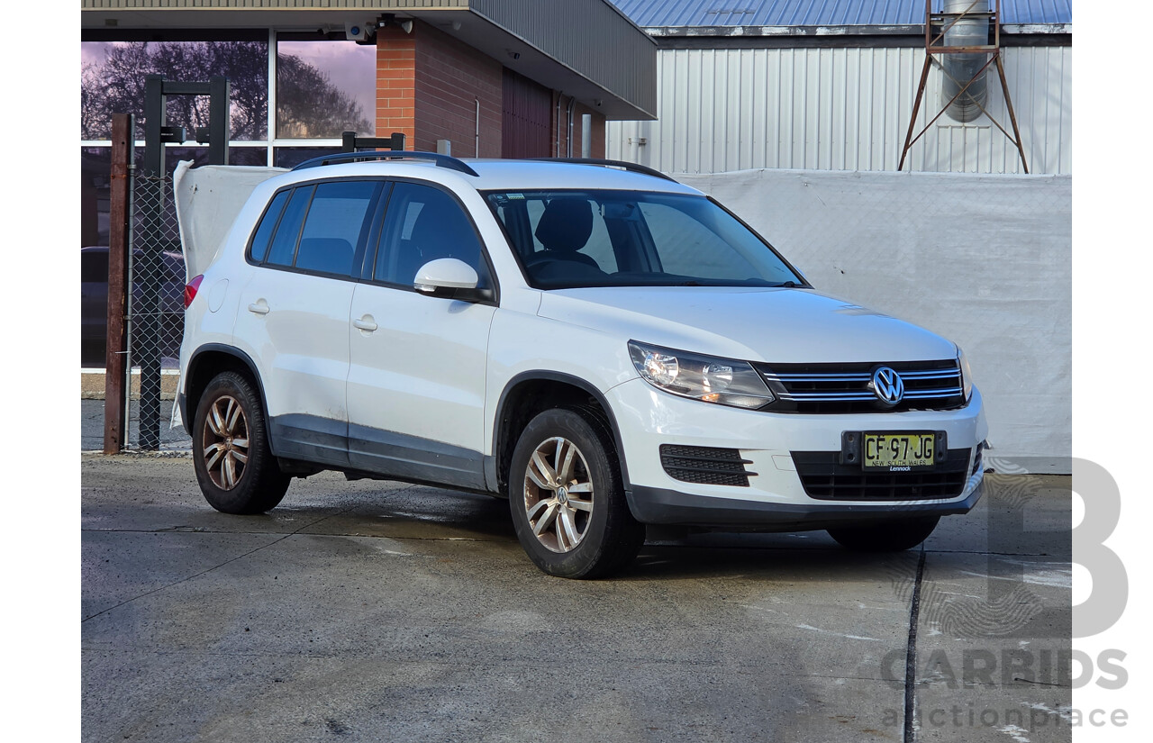 8/2013 Volkswagen Tiguan 118 TSI (4x2) 5NC MY13.5 4d Wagon White 1.4L