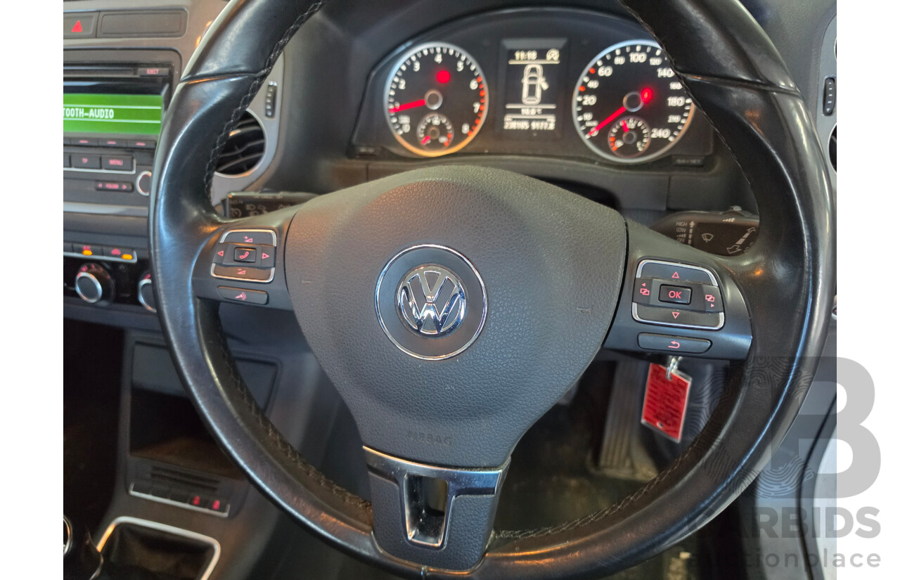 8/2013 Volkswagen Tiguan 118 TSI (4x2) 5NC MY13.5 4d Wagon White 1.4L