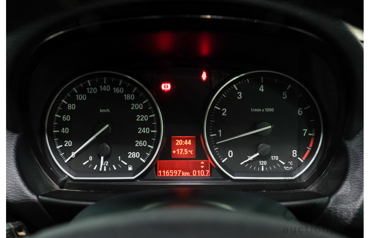 4/2010 BMW 135i Sport E82 MY11 2d Coupe Alpin White Turbo 3.0L