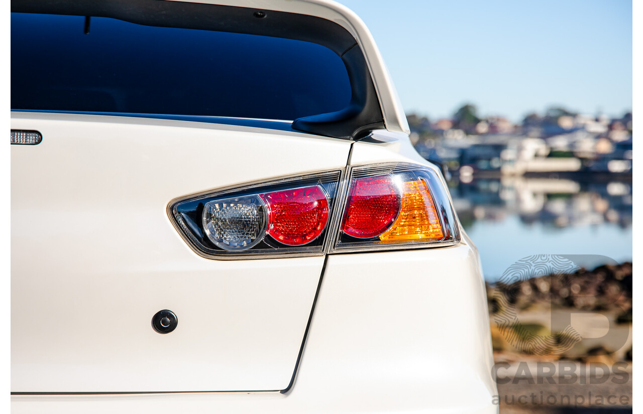 09/2021 Mitsubishi Lancer Evolution Final Edition (AWD) CJ MY15 4d Sedan White Turbo 2.0L