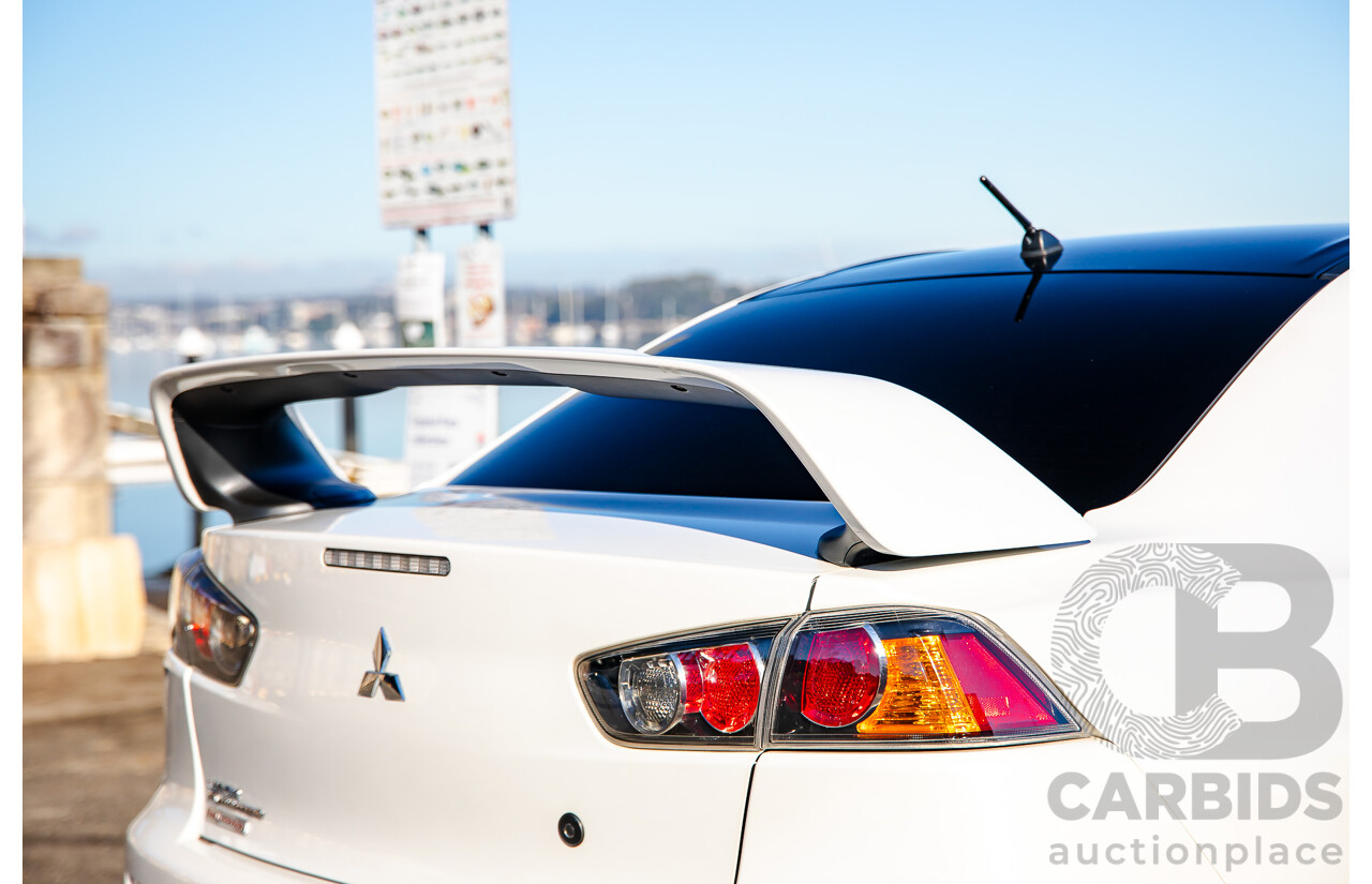 09/2021 Mitsubishi Lancer Evolution Final Edition (AWD) CJ MY15 4d Sedan White Turbo 2.0L