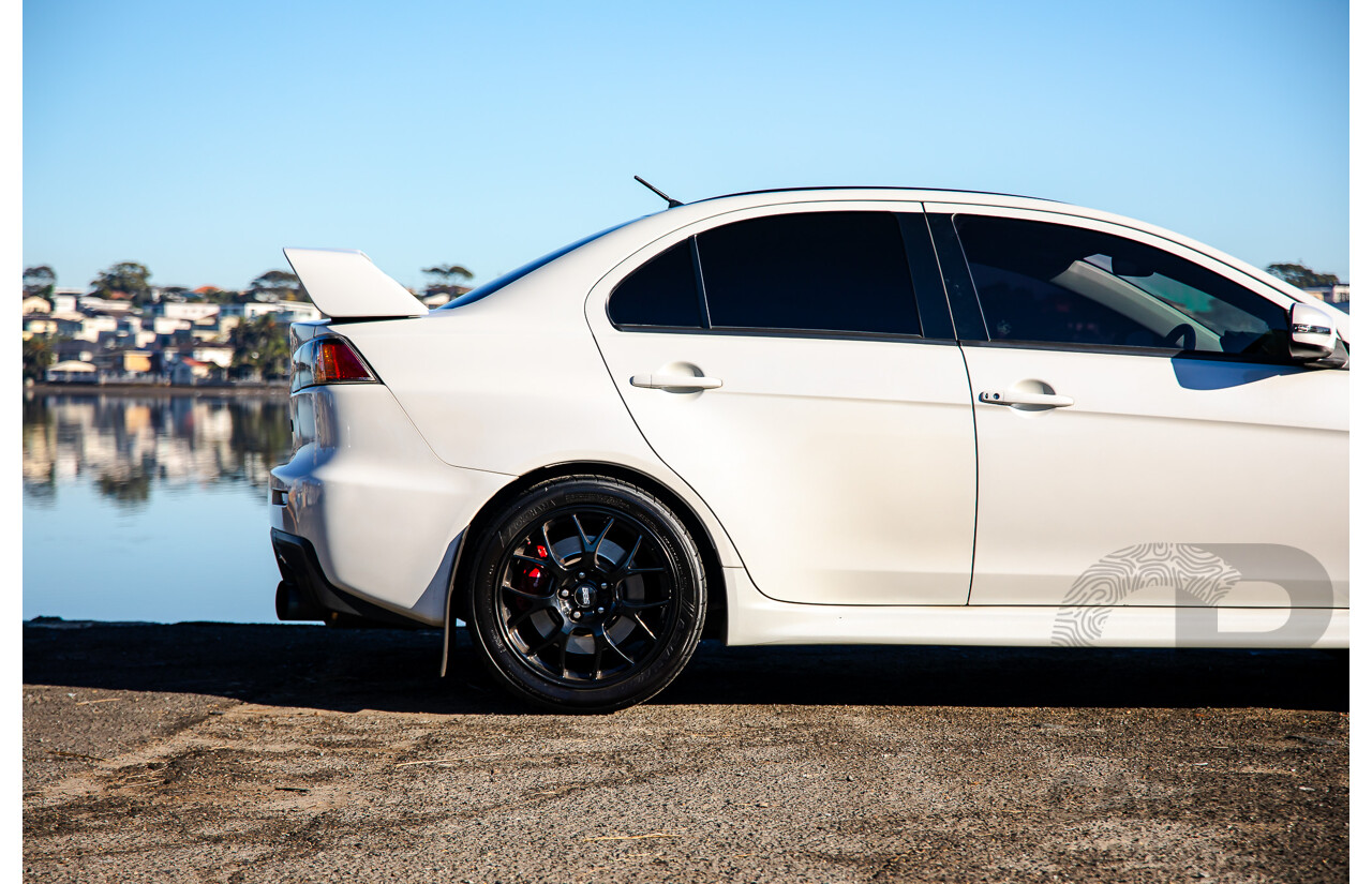 09/2021 Mitsubishi Lancer Evolution Final Edition (AWD) CJ MY15 4d Sedan White Turbo 2.0L