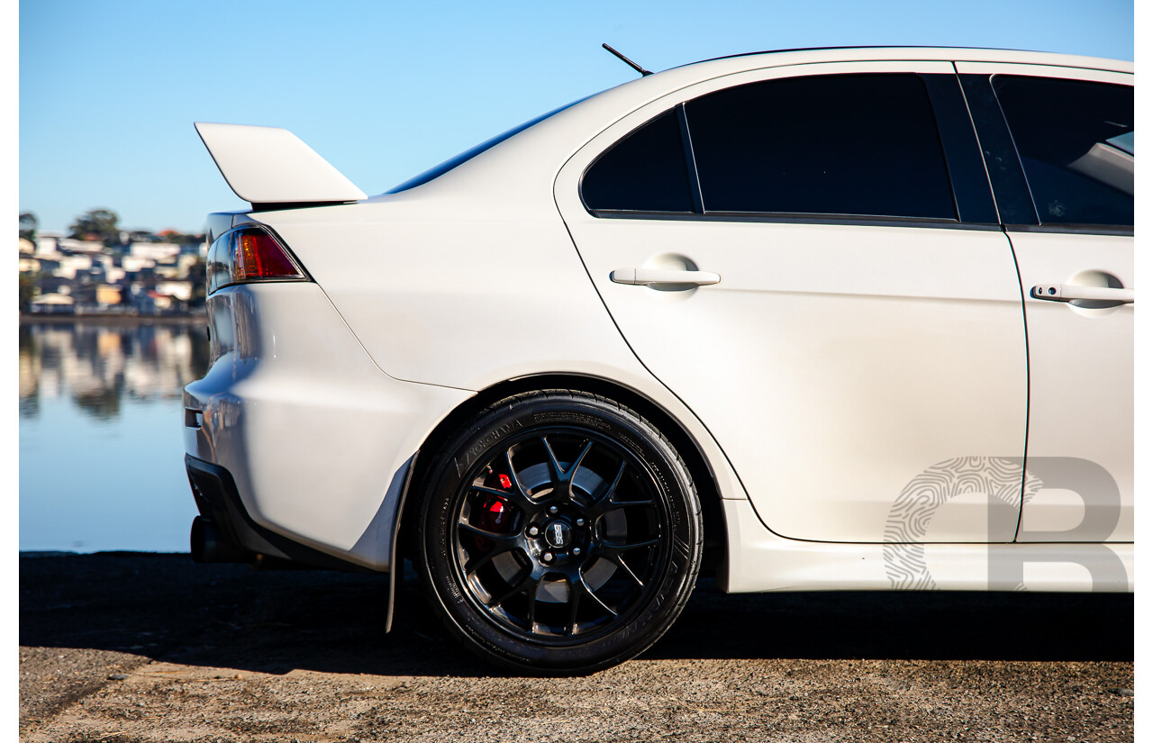 09/2021 Mitsubishi Lancer Evolution Final Edition (AWD) CJ MY15 4d Sedan White Turbo 2.0L