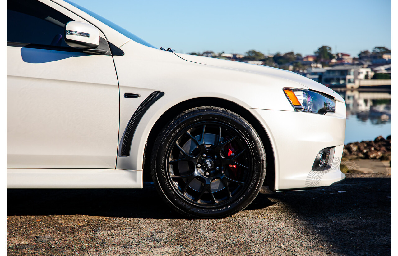 09/2021 Mitsubishi Lancer Evolution Final Edition (AWD) CJ MY15 4d Sedan White Turbo 2.0L