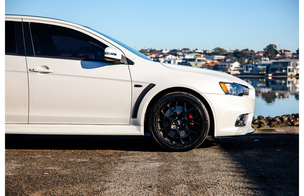 09/2021 Mitsubishi Lancer Evolution Final Edition (AWD) CJ MY15 4d Sedan White Turbo 2.0L