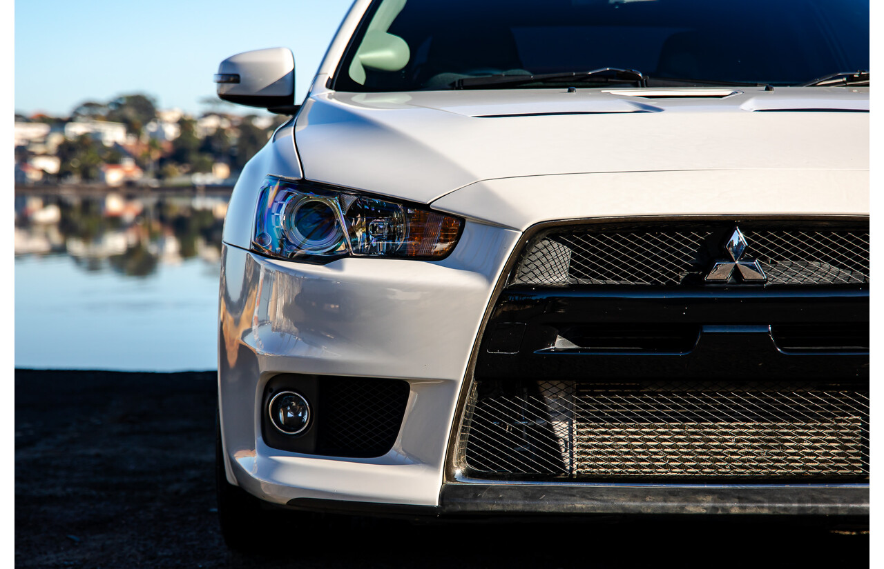 09/2021 Mitsubishi Lancer Evolution Final Edition (AWD) CJ MY15 4d Sedan White Turbo 2.0L