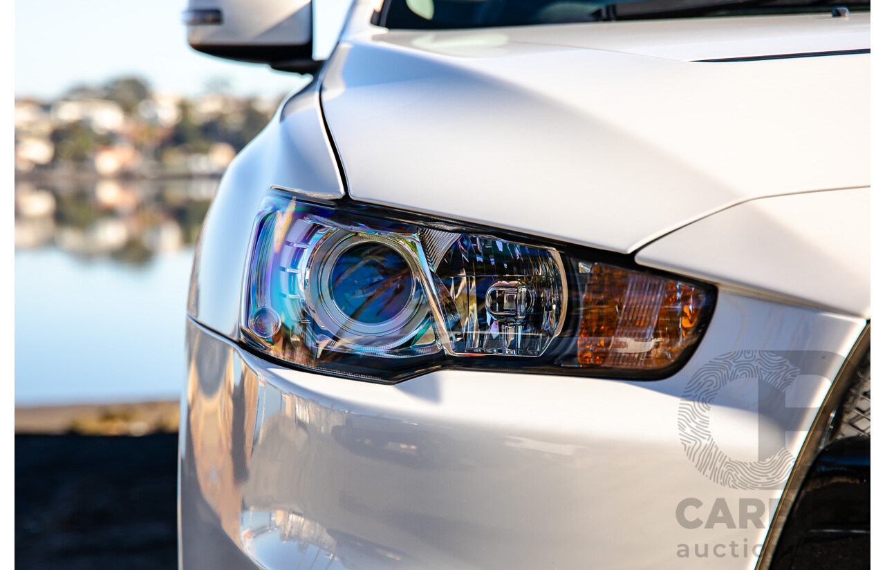 09/2021 Mitsubishi Lancer Evolution Final Edition (AWD) CJ MY15 4d Sedan White Turbo 2.0L