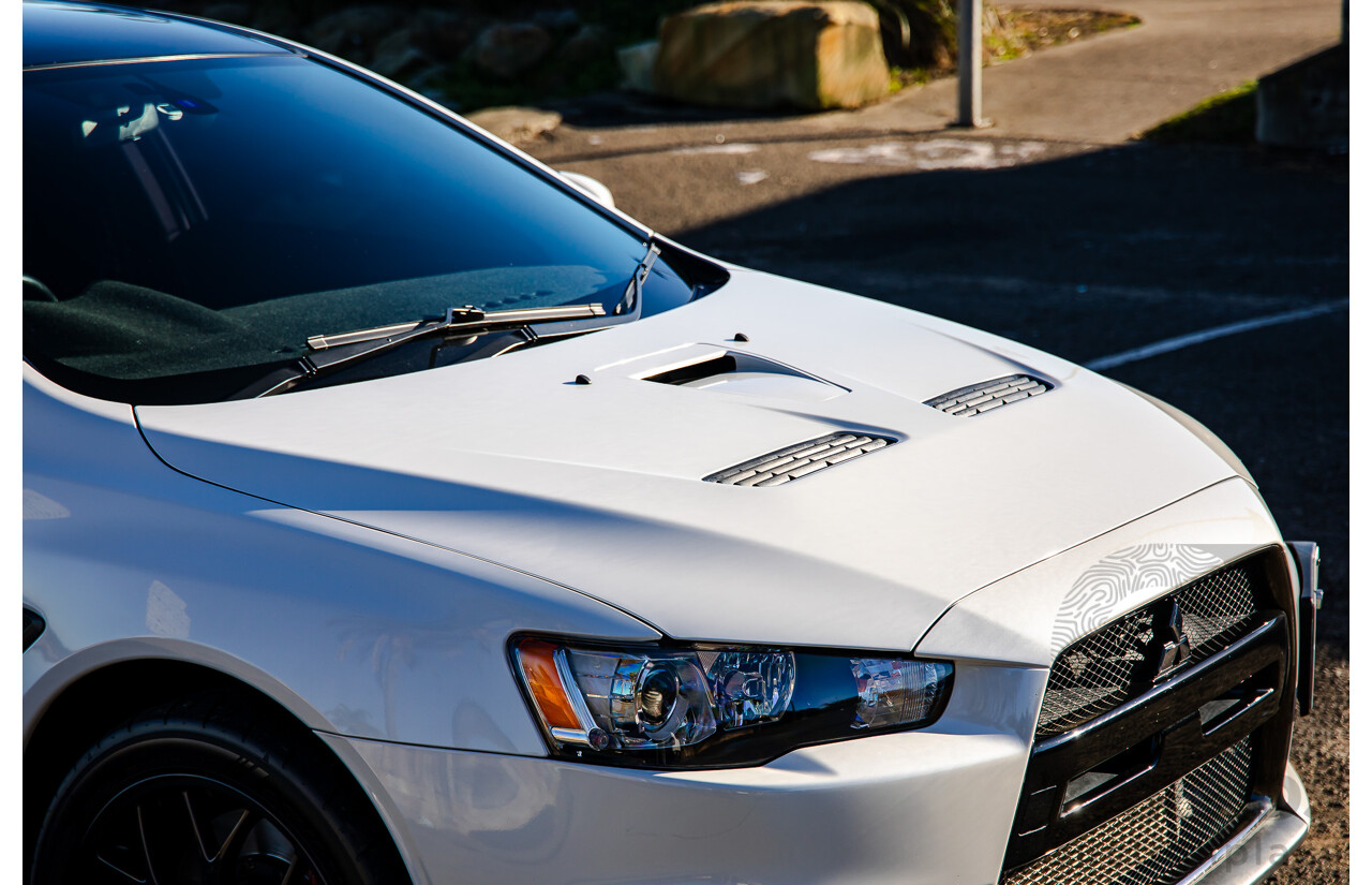 09/2021 Mitsubishi Lancer Evolution Final Edition (AWD) CJ MY15 4d Sedan White Turbo 2.0L