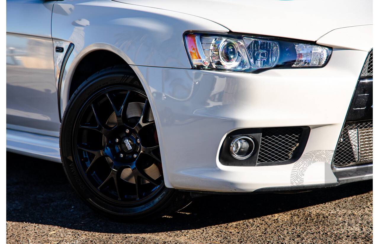 09/2021 Mitsubishi Lancer Evolution Final Edition (AWD) CJ MY15 4d Sedan White Turbo 2.0L