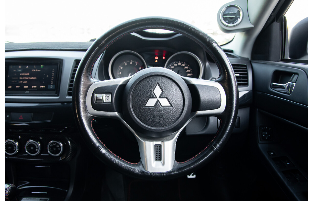 09/2021 Mitsubishi Lancer Evolution Final Edition (AWD) CJ MY15 4d Sedan White Turbo 2.0L