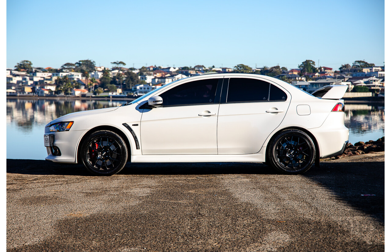 09/2021 Mitsubishi Lancer Evolution Final Edition (AWD) CJ MY15 4d Sedan White Turbo 2.0L