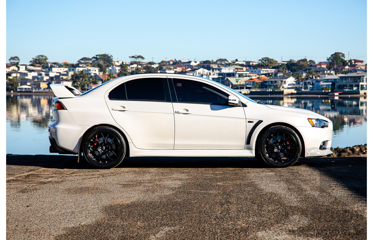 09/2021 Mitsubishi Lancer Evolution Final Edition (AWD) CJ MY15 4d Sedan White Turbo 2.0L