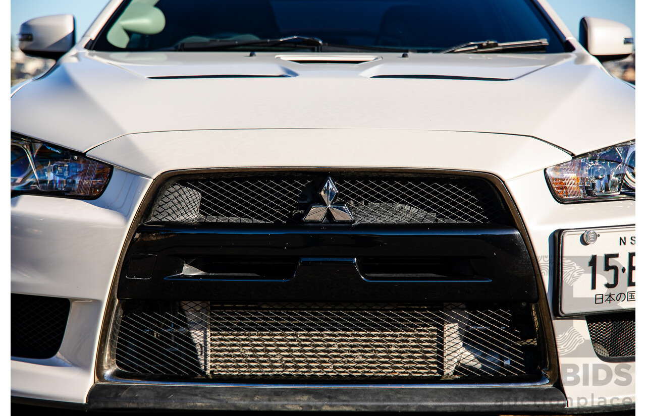 09/2021 Mitsubishi Lancer Evolution Final Edition (AWD) CJ MY15 4d Sedan White Turbo 2.0L