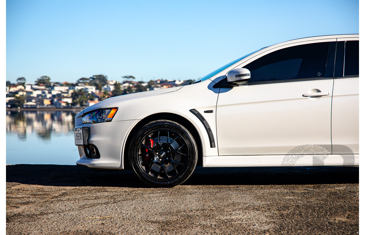 09/2021 Mitsubishi Lancer Evolution Final Edition (AWD) CJ MY15 4d Sedan White Turbo 2.0L