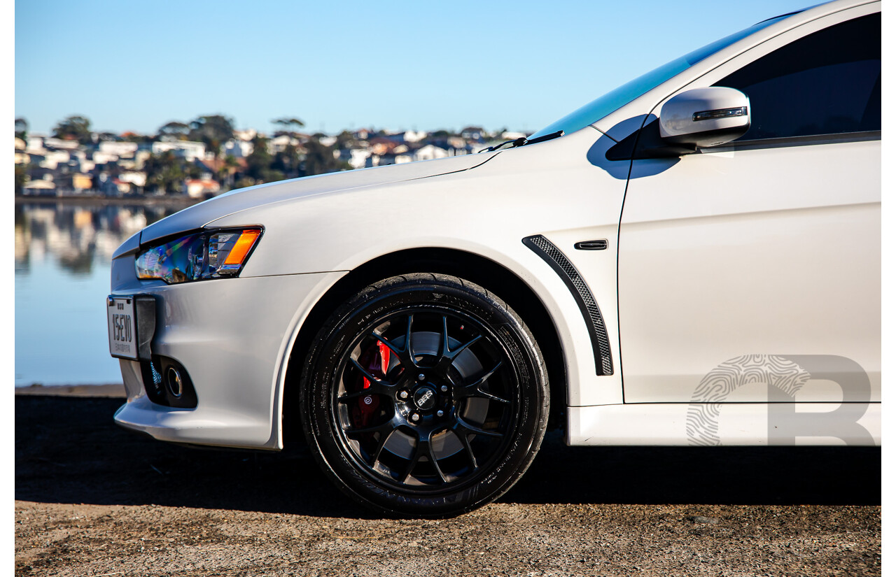 09/2021 Mitsubishi Lancer Evolution Final Edition (AWD) CJ MY15 4d Sedan White Turbo 2.0L