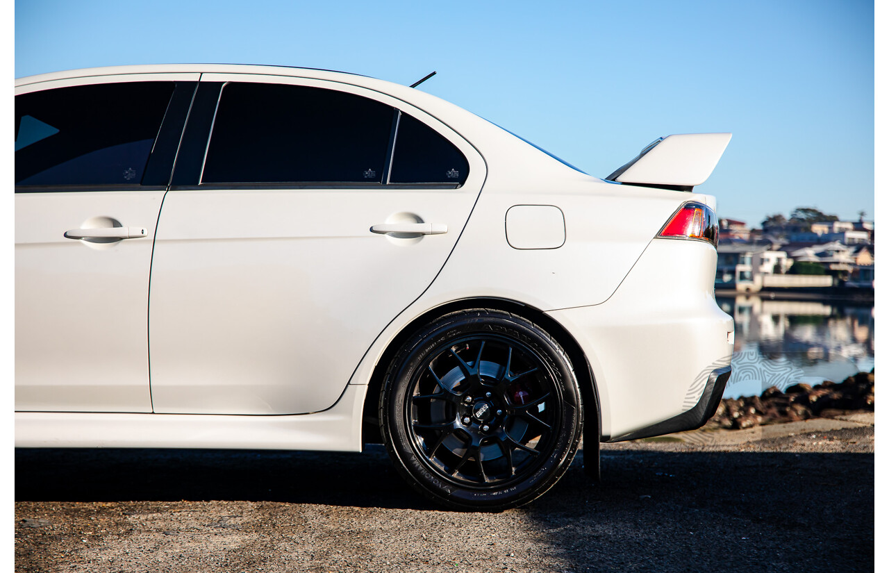 09/2021 Mitsubishi Lancer Evolution Final Edition (AWD) CJ MY15 4d Sedan White Turbo 2.0L