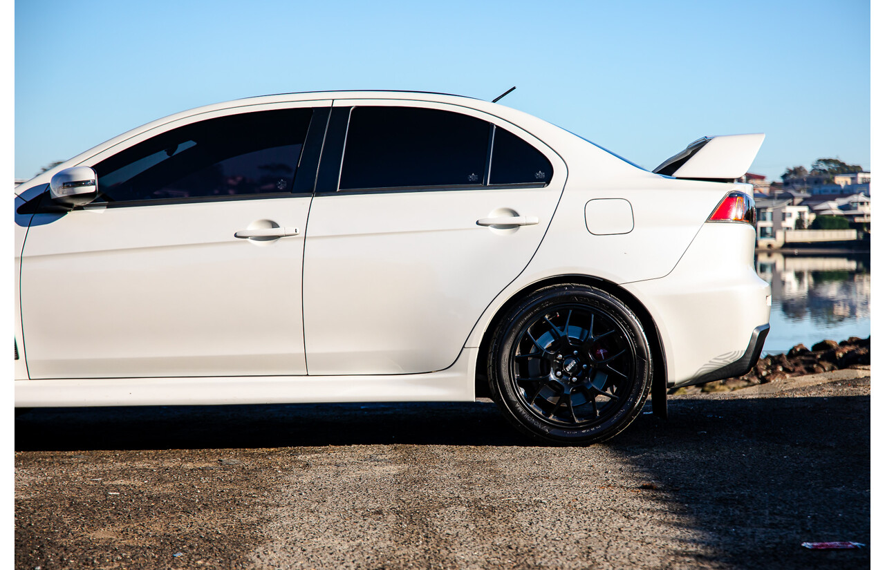 09/2021 Mitsubishi Lancer Evolution Final Edition (AWD) CJ MY15 4d Sedan White Turbo 2.0L