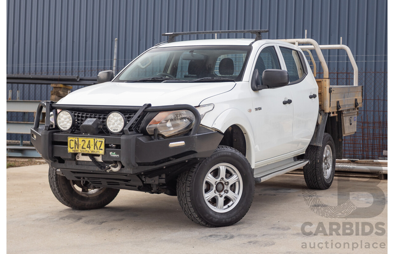 6/2017 Mitsubishi Triton GLX (4x4) MQ MY17 Dual Cab Utility White Turbo Diesel 2.4L