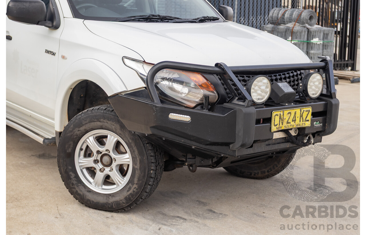 6/2017 Mitsubishi Triton GLX (4x4) MQ MY17 Dual Cab Utility White Turbo Diesel 2.4L