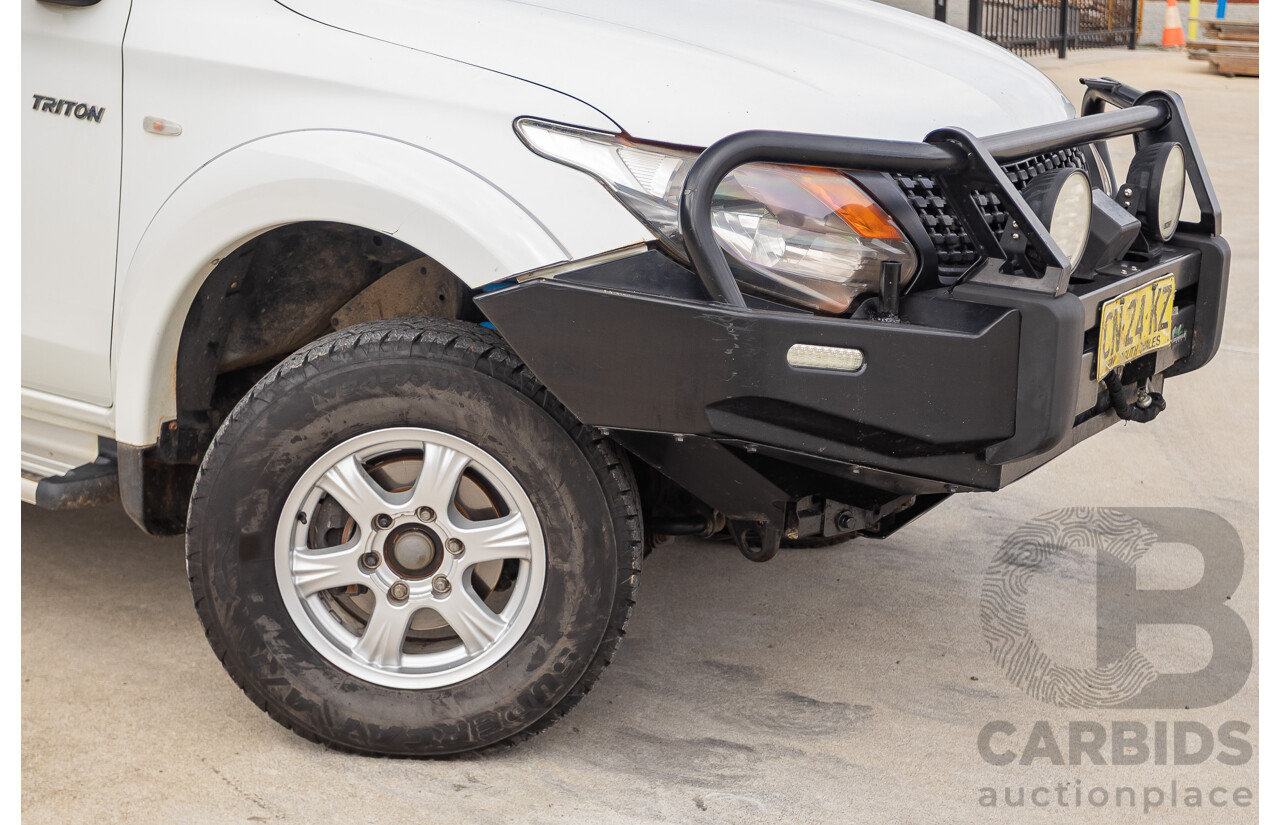 6/2017 Mitsubishi Triton GLX (4x4) MQ MY17 Dual Cab Utility White Turbo Diesel 2.4L