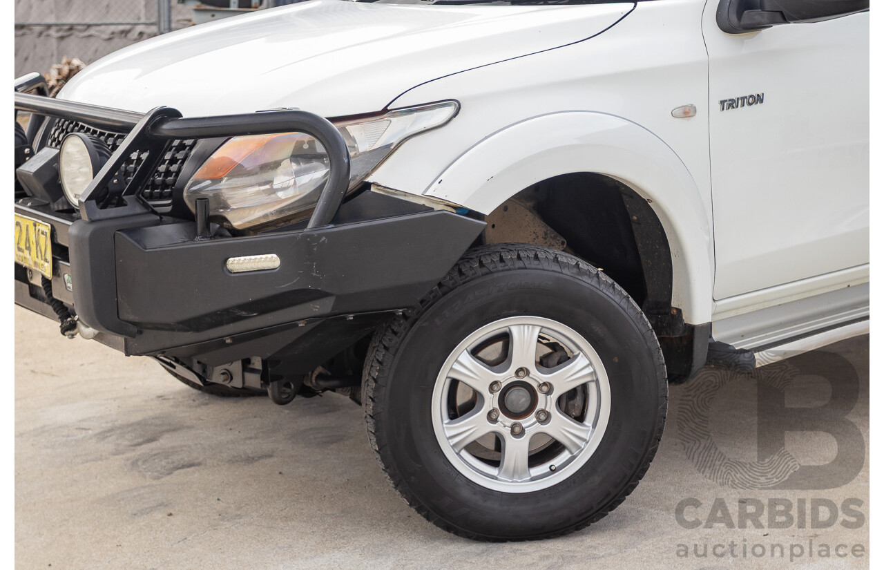 6/2017 Mitsubishi Triton GLX (4x4) MQ MY17 Dual Cab Utility White Turbo Diesel 2.4L
