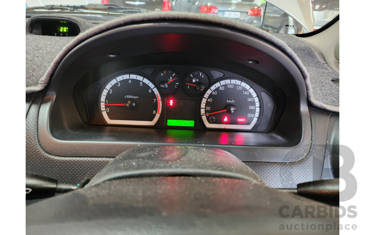 6/2009 Holden Barina  TK MY09 3d Hatchback Grey 1.6L