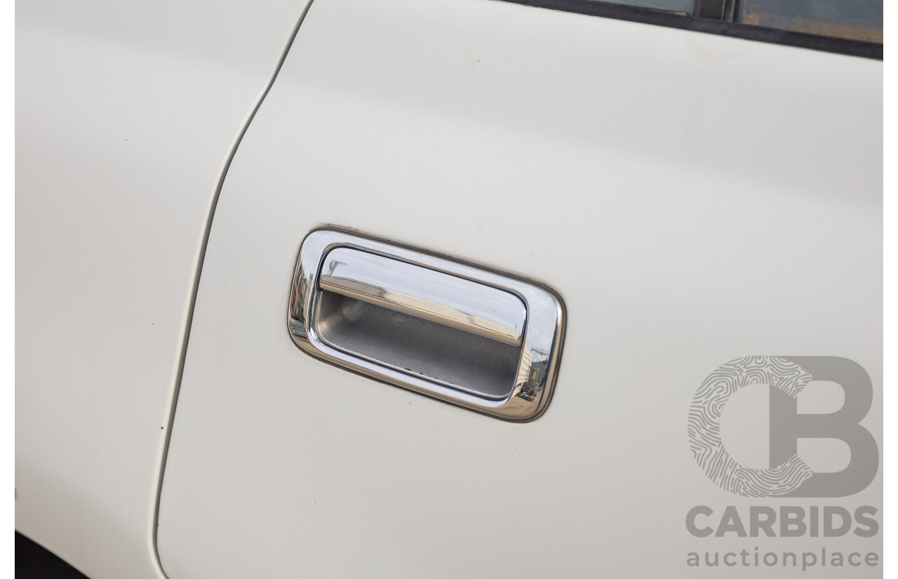 11/1993 Toyota Landcruiser DX (4x4) 4D Wagon Glacial White Diesel 4.2L