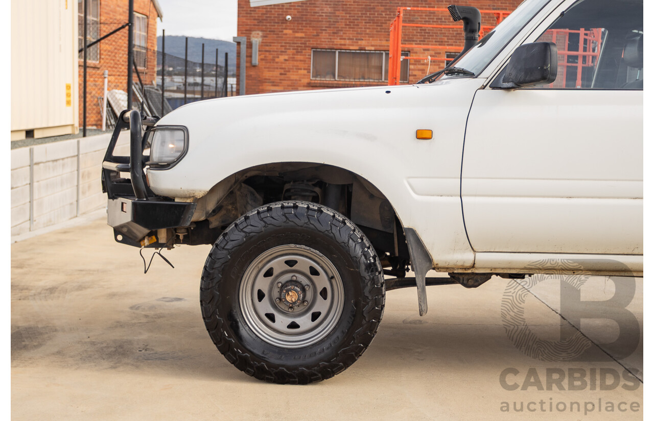 11/1993 Toyota Landcruiser DX (4x4) 4D Wagon Glacial White Diesel 4.2L