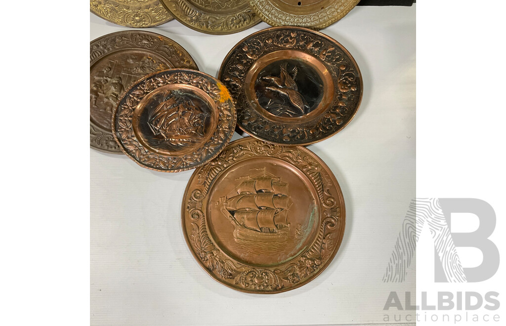 Collection of Seven Large Copper and Brass Decorative Wall Plates