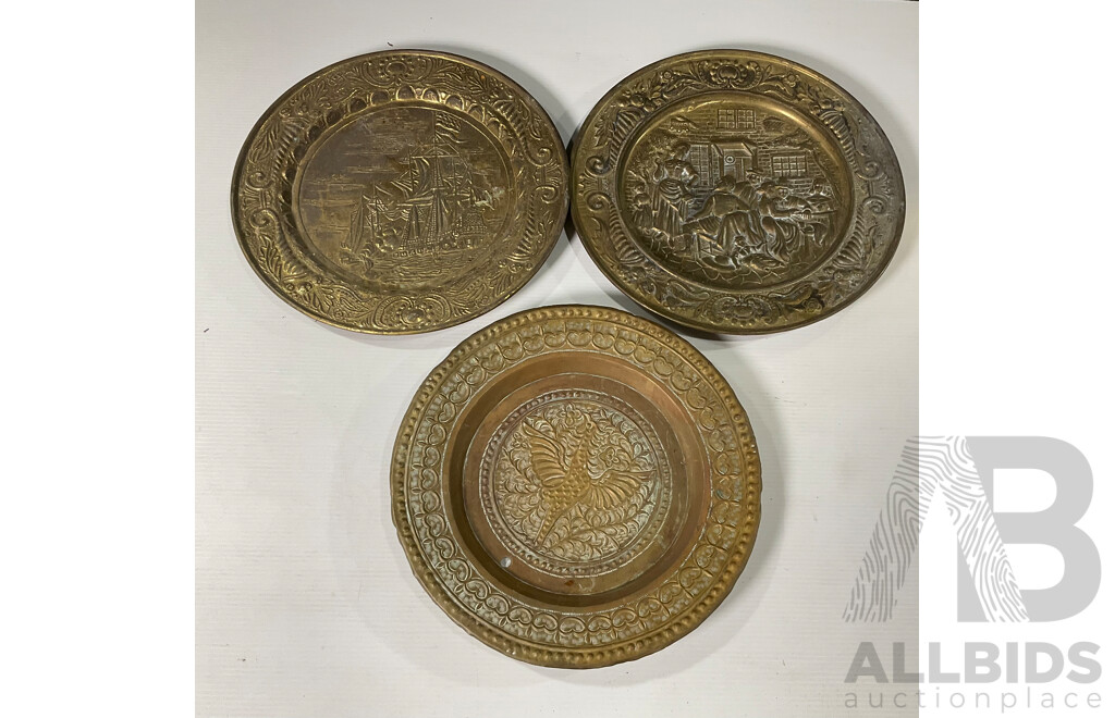 Collection of Seven Large Copper and Brass Decorative Wall Plates