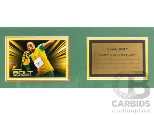 1662302 · Framed Signed Usain Bolt Team Jamaica Team Shirt