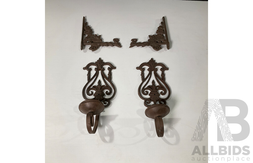 Collection of Four Wall Mounted Cast Iron Candle Holders and Decorative Brackets