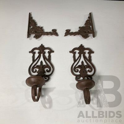 Collection of Four Wall Mounted Cast Iron Candle Holders and Decorative Brackets